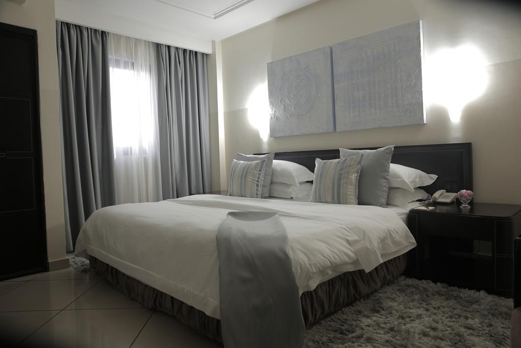 Oak Plaza Hotels East Airport Άκρα Δωμάτιο φωτογραφία